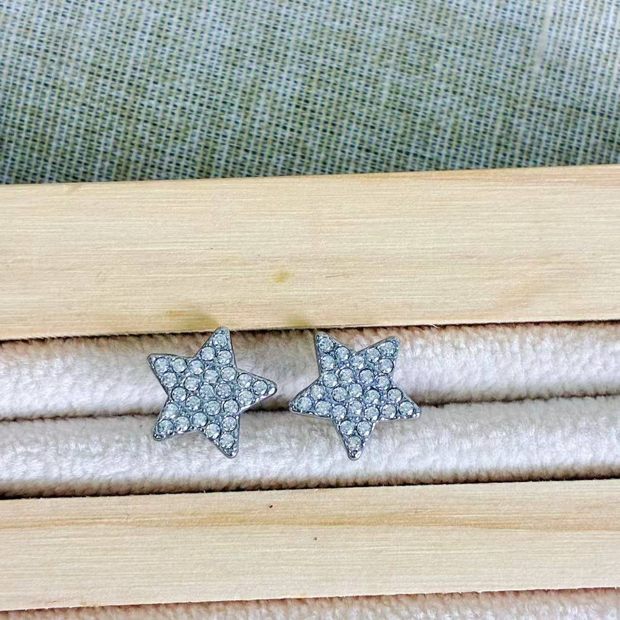 Orecchini “Luce di Stella” – Brillanti a Forma di Stella in Acciaio Argento