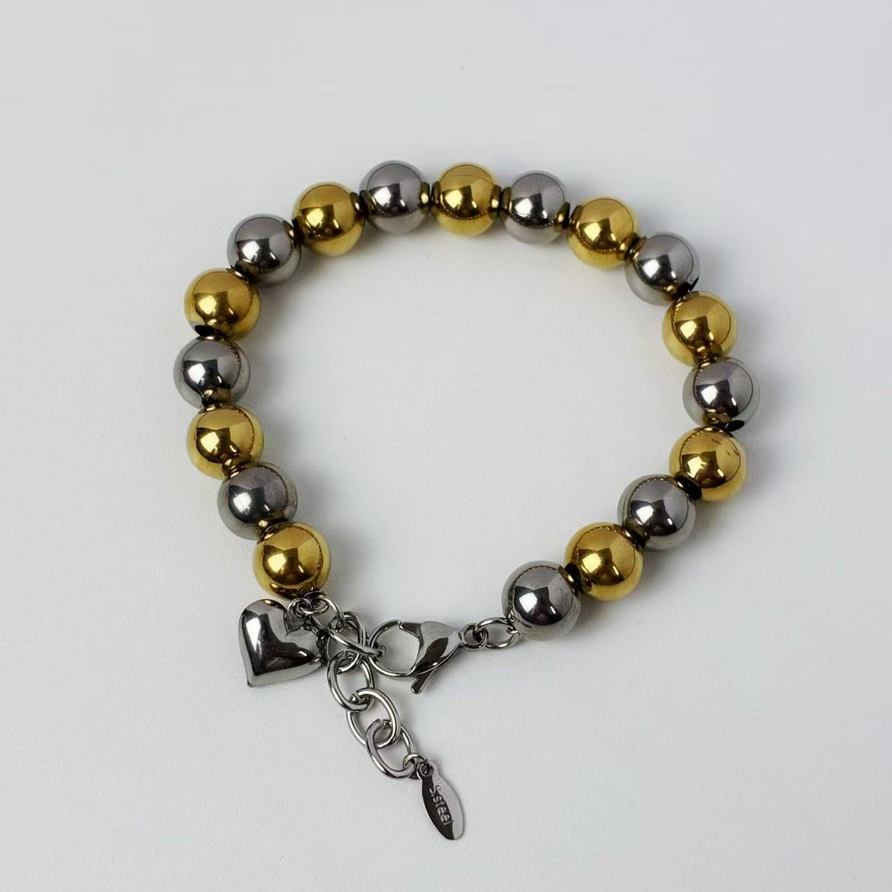 Bracciale con sfere a sonaglio