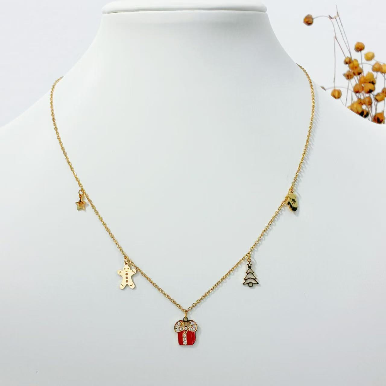 Collana con Ciondolini Natalizi – Eleganza Festiva in Oro