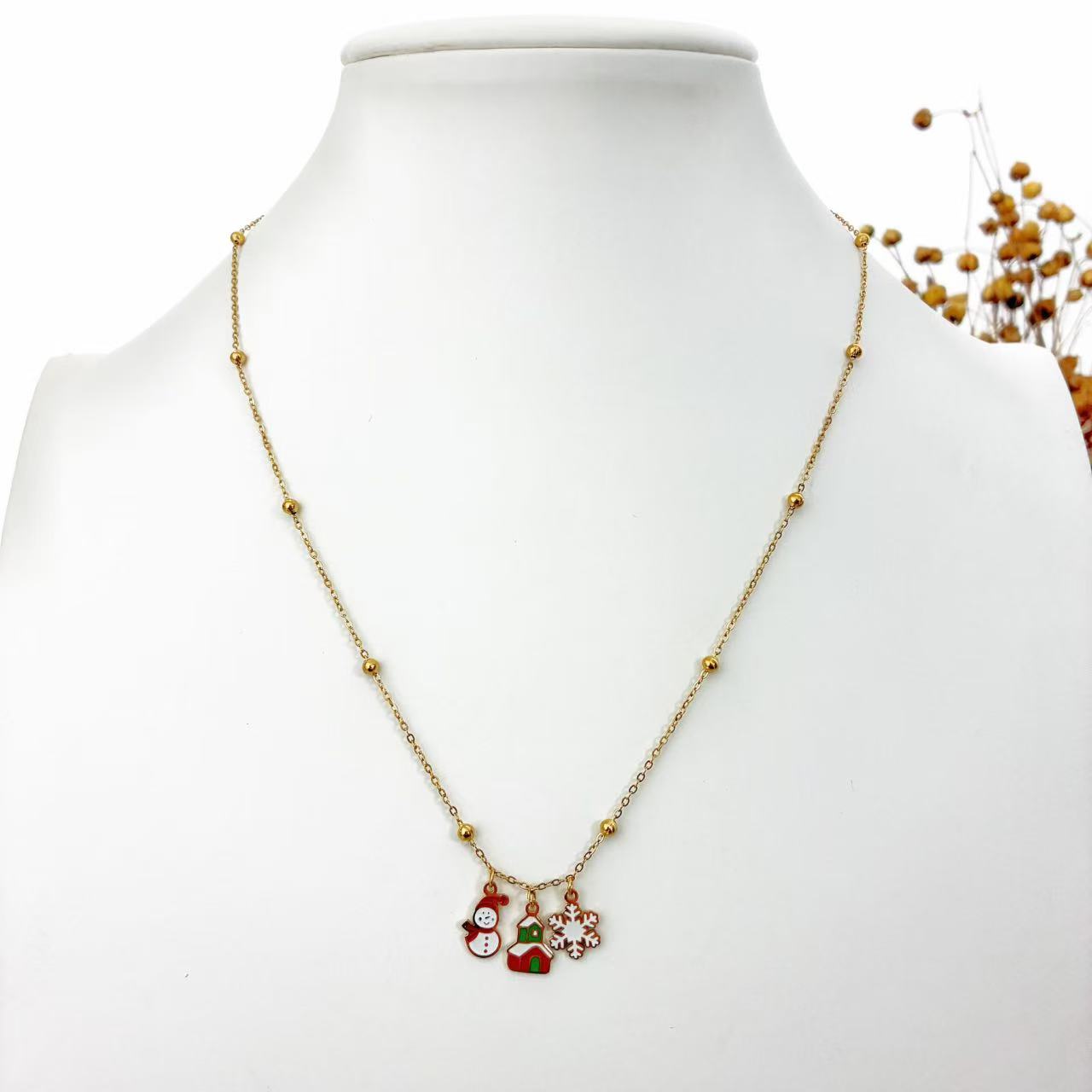 Collana con Ciondoli Natalizi – Magia delle Feste