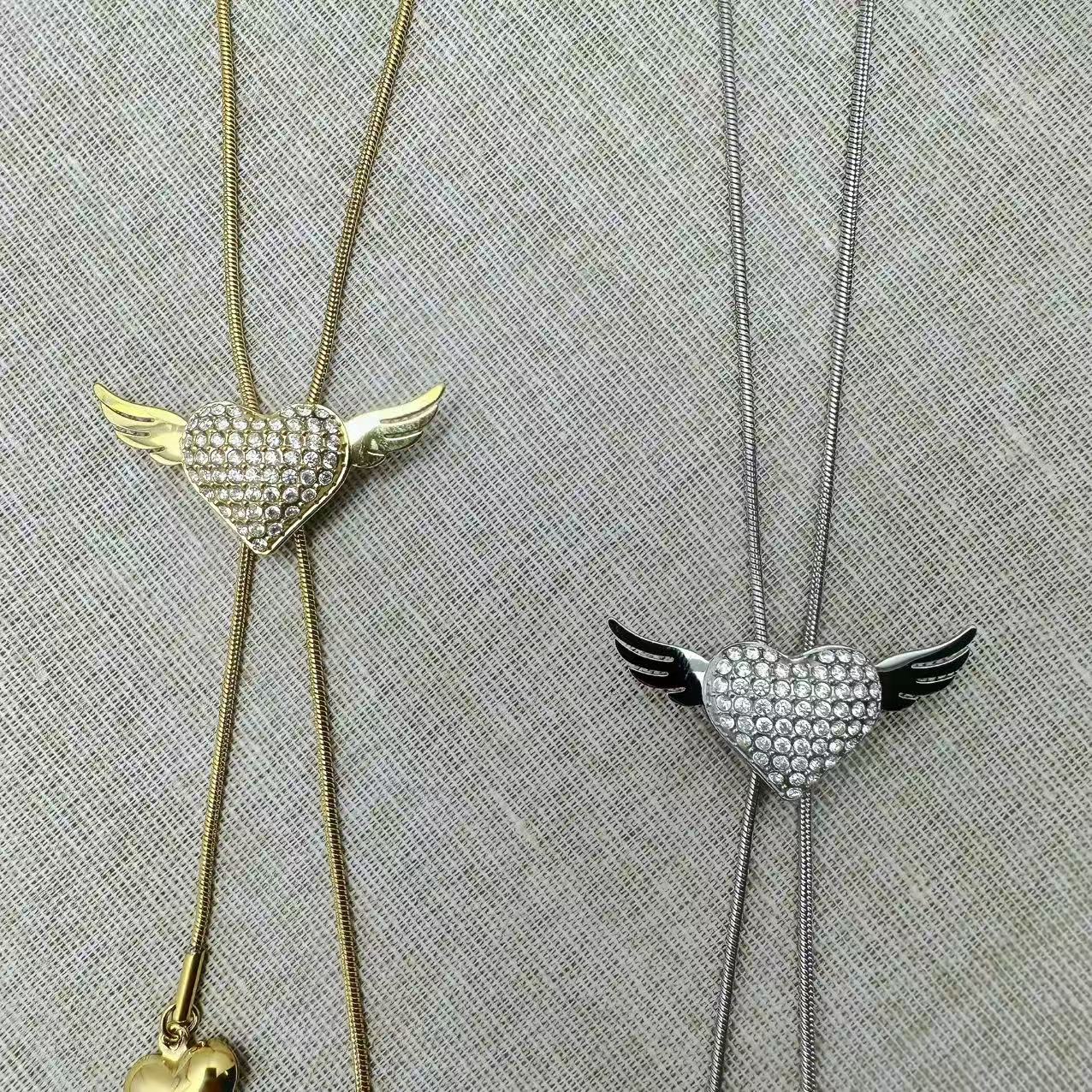 (C308)Collana cuori chevalier con ali