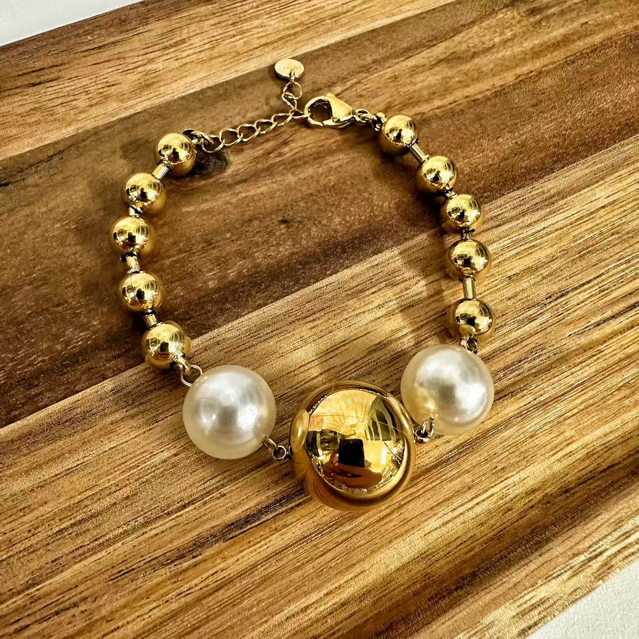 (B063) BRACCIALE DONNA IN ACCIAIO INOX CON SFERE