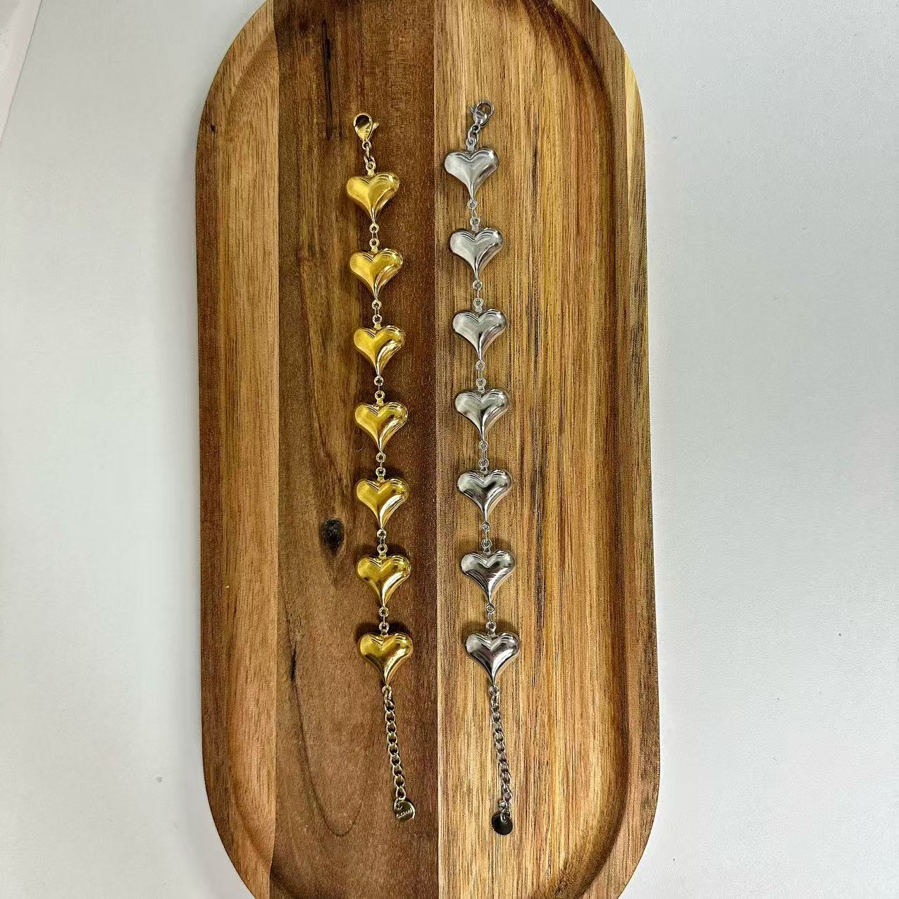 (B069) BRACCIALE DONNA CON CUORI IN ACCIAIO INOX