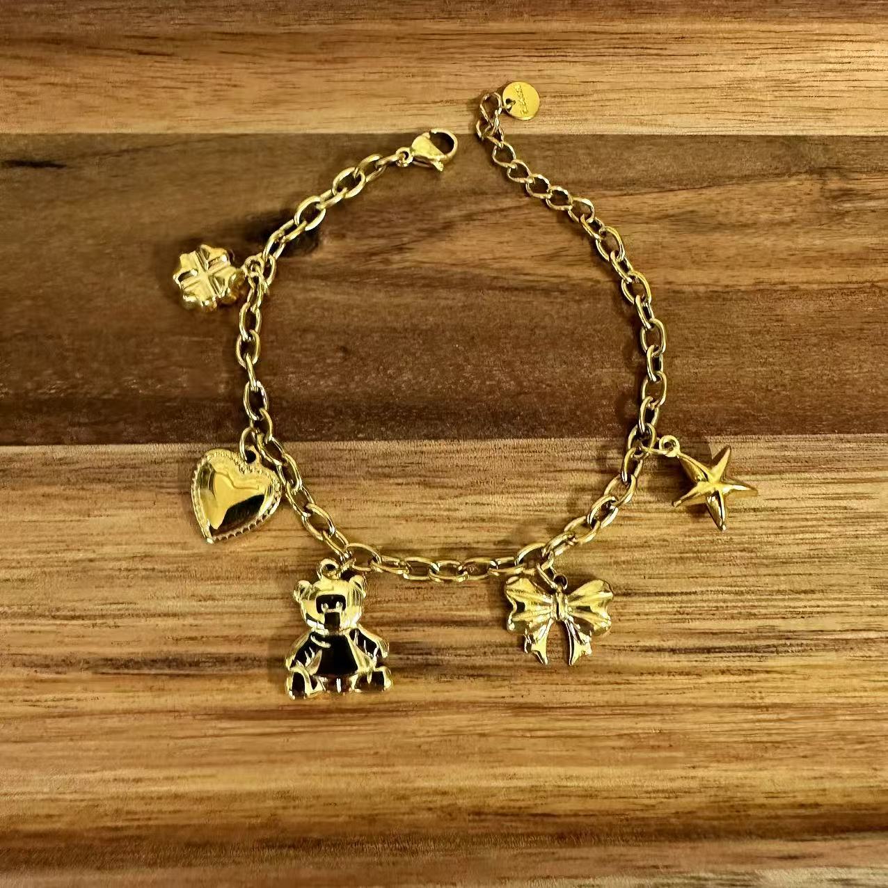 (B080) BRACCIALE DONNA CON PENDENTI TEDDY IN ACCIAIO INOX