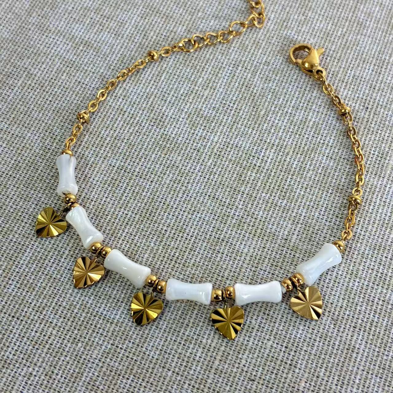 Collana “Cuori di Bambù” – Fascino Naturale e Dettagli Preziosi