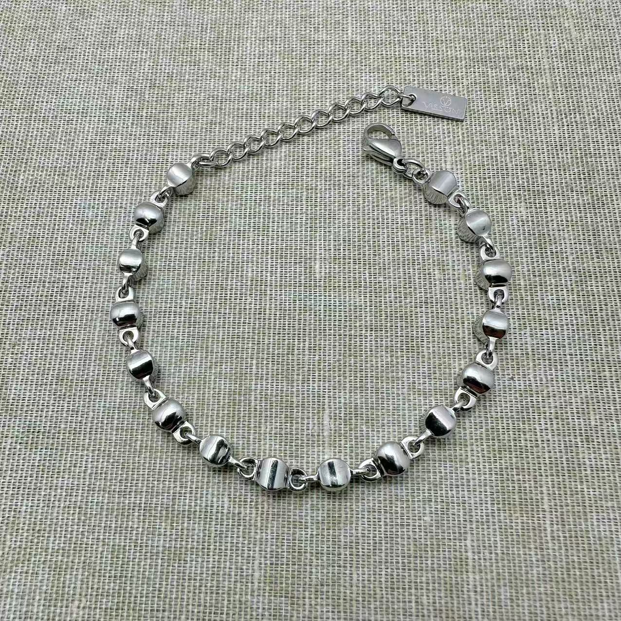 (B179)Bracciale dodi tondi in acciaio inox