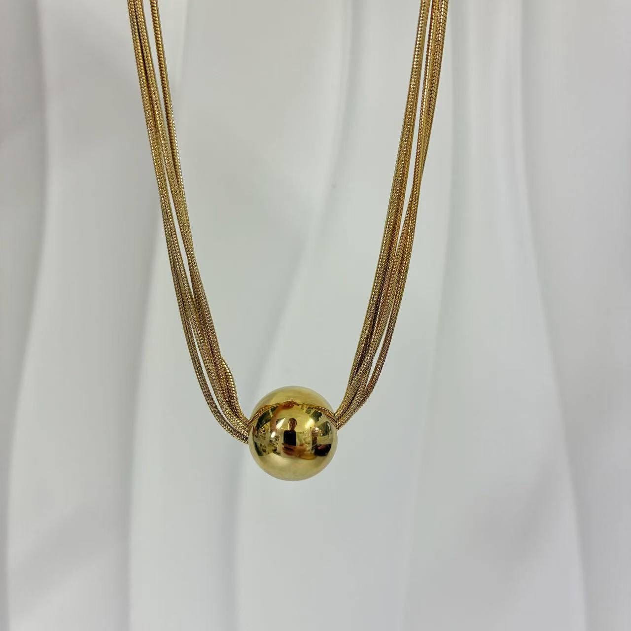 (C235)Collana 5 fili con pallina in acciaio inox