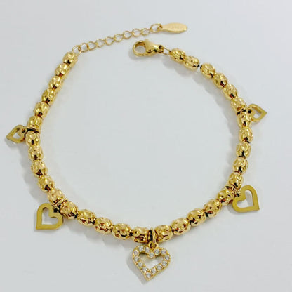 Bracciale “Cuori di Luce” – Romantica Eleganza in Oro Brillante