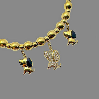 (B181)Bracciale semirigido con sfere e cagnolini