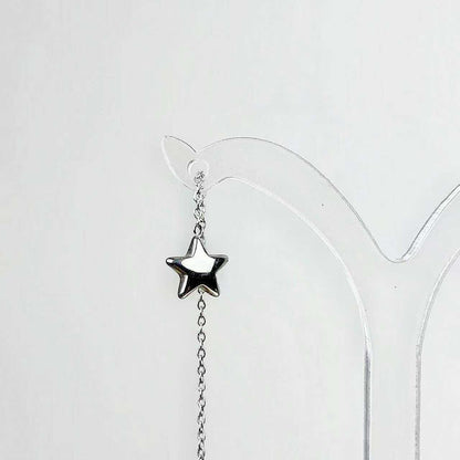 Orecchino “Stella Errante” – Pendente Essenziale dal Fascino Sospeso