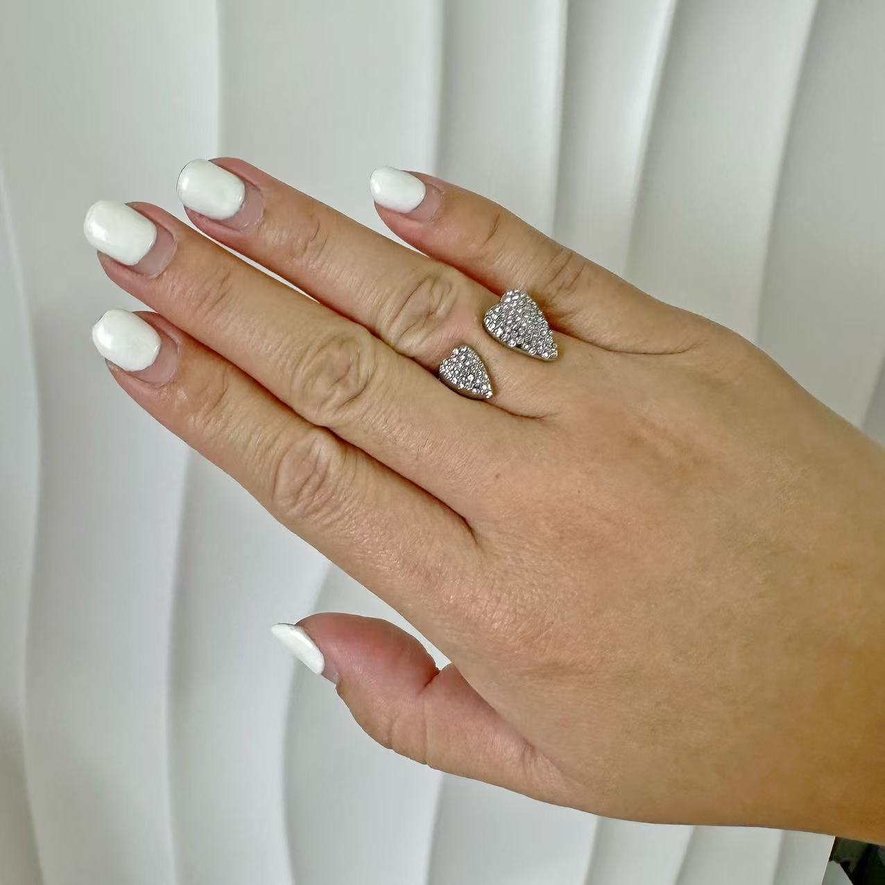 (A100)Anello due cuori con pavé regolabile in acciaio inox