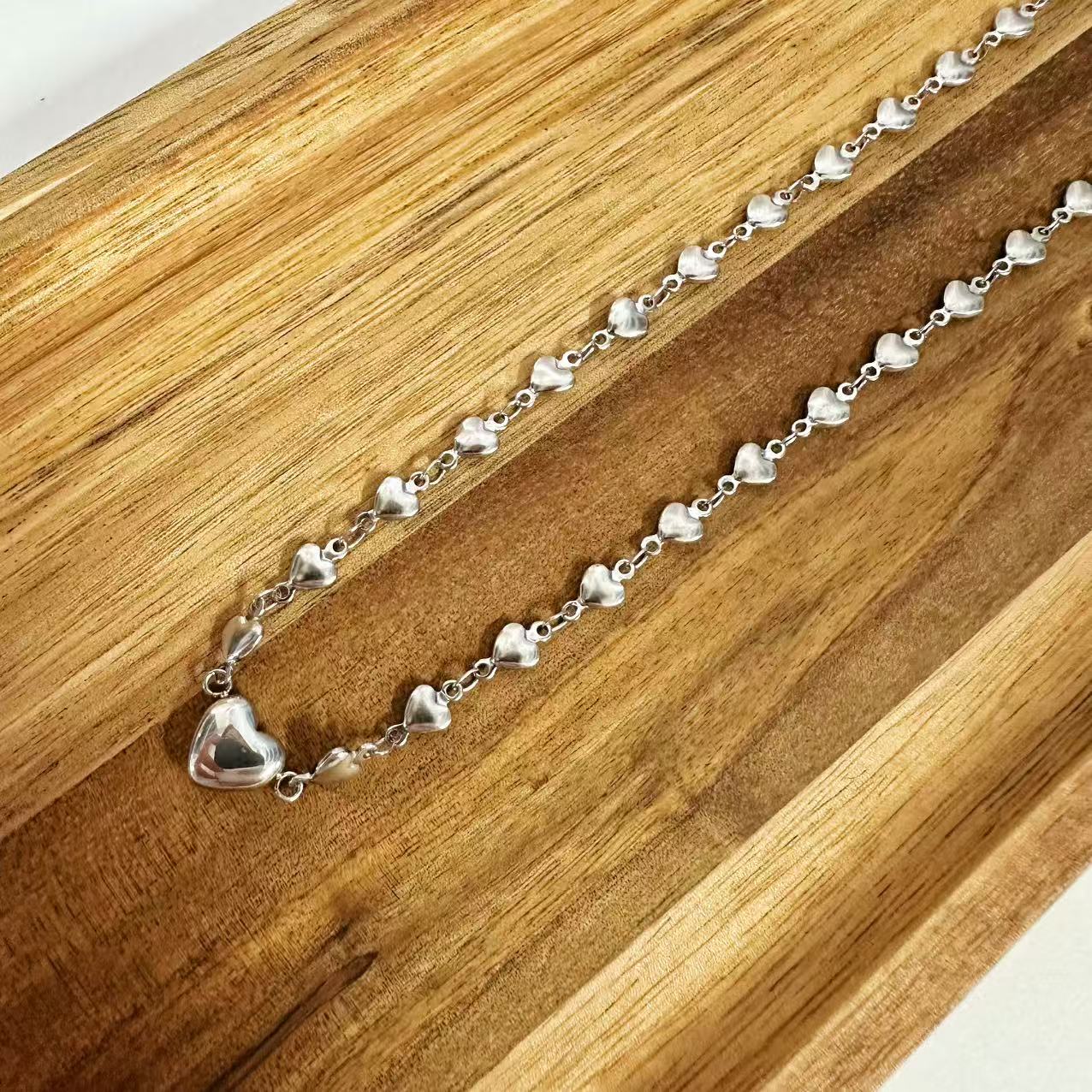 (C119)Collana cuoricini in acciaio inox