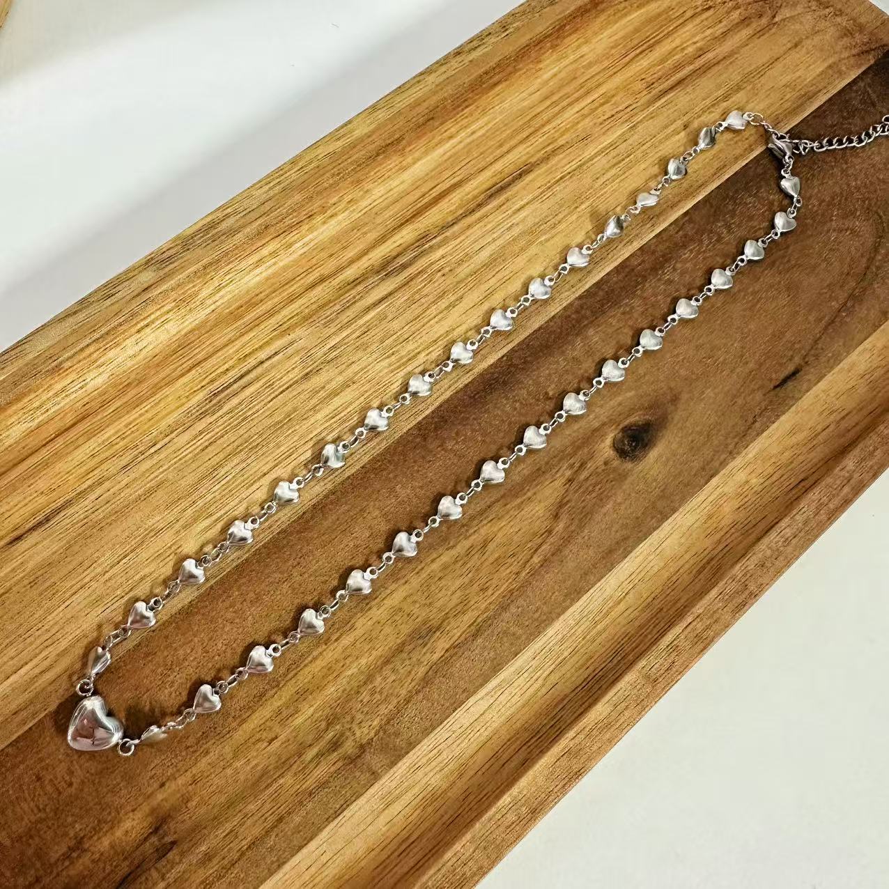 (C119)Collana cuoricini in acciaio inox