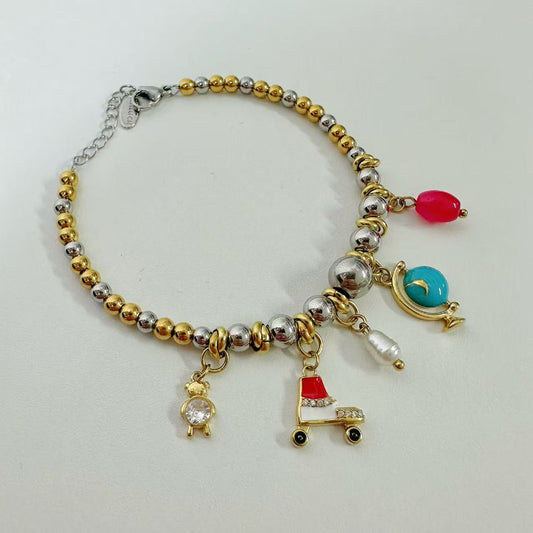 (B122)Bracciale bicolore in acciaio inox con tanti ciondoli