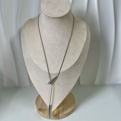 (C124)Collana saliscendi gocce allungate in acciaio inox