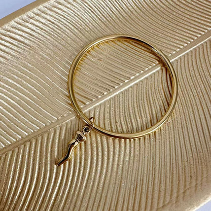 (B126)Bracciale rigido con ciondolo in acciaio inox