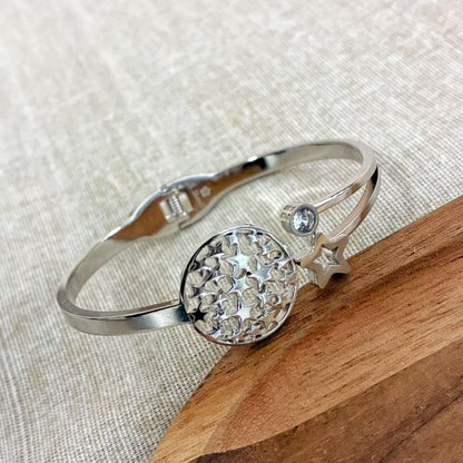 Bracciale rigido silver con or stelle con la chiusura a molla