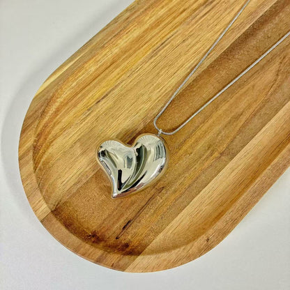 (C132) COLLANA CUORE BOMBATO IN ACCIAIO INOX