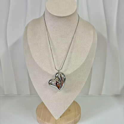 (C132) COLLANA CUORE BOMBATO IN ACCIAIO INOX