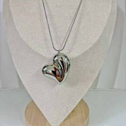 (C132) COLLANA CUORE BOMBATO IN ACCIAIO INOX