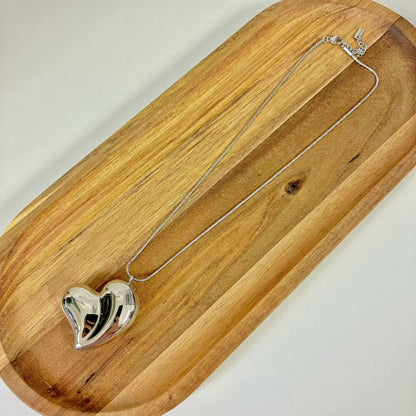 (C132) COLLANA CUORE BOMBATO IN ACCIAIO INOX