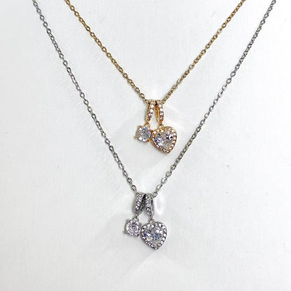 Collana “Cuori Gemelli” – Romantica Brillantezza con Doppio Pendente