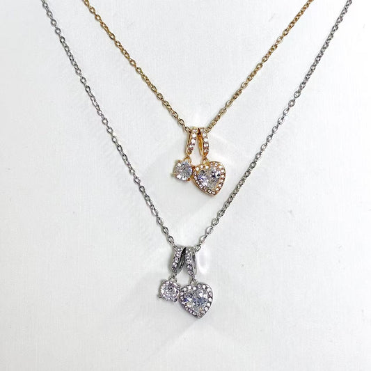 Collana “Cuori Gemelli” – Romantica Brillantezza con Doppio Pendente