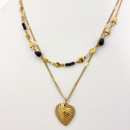 Collana Doppiostrato con Cuori & Dettagli Neri – Eleganza Dorata Moderna