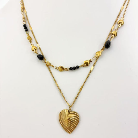 Collana Doppiostrato con Cuori & Dettagli Neri – Eleganza Dorata Moderna