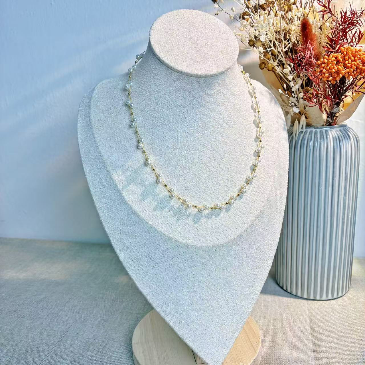 Collana “Perla Doppia” – Eleganza intrecciata