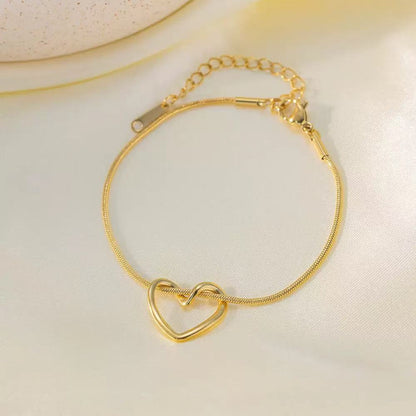 Bracciale "Nodo d'Amore" – Maglia Snake con Cuore Intrecciato