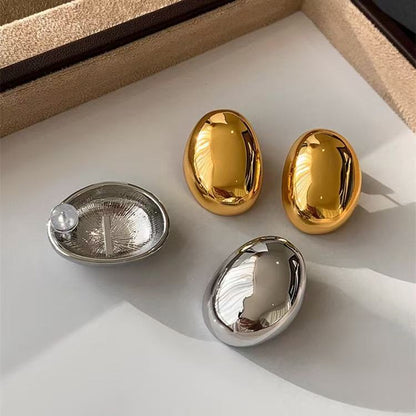 Orecchini Ovali Scultorei — Linee Morbide e Eleganza Contemporanea