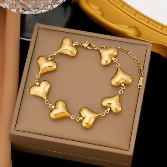 [Offerte] Bracciale "Battito Infinito" – Catena di Cuori Bombati in Acciaio