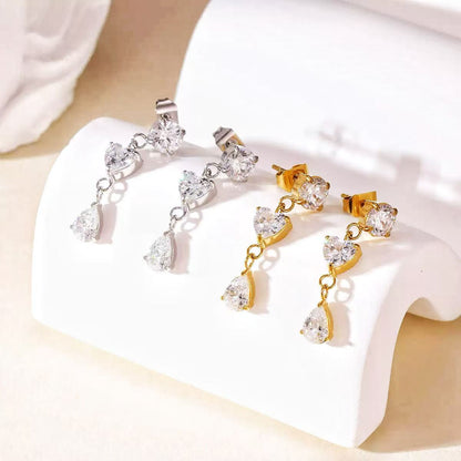 Orecchini "Trilogia di Cristallo" – Pendenti Luminosi in Acciaio