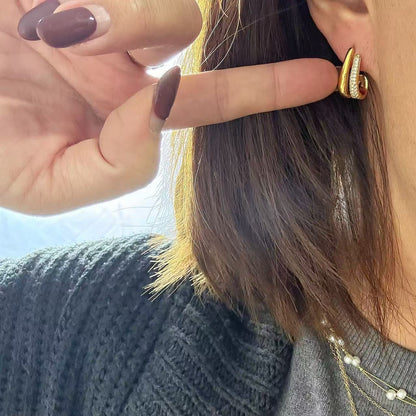 Orecchini “Doppia Luce” – L’incontro delle linee