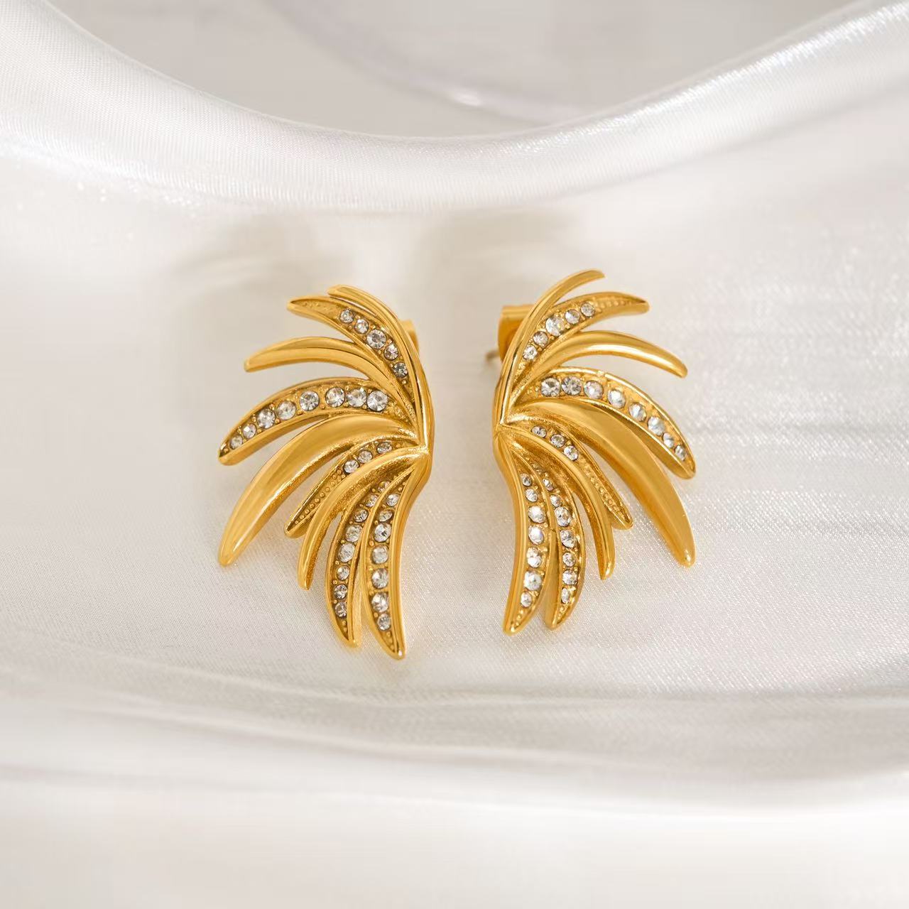 Orecchini Ventaglio Brillante — Eleganza Scultorea e Fascino Luminoso