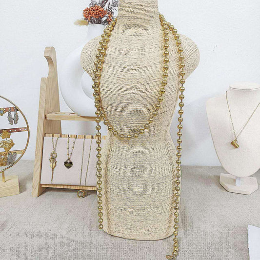 Collana lunga con perle dorate