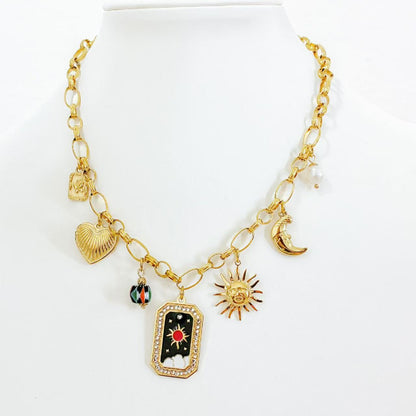 Collana con Ciondoli Astrali – Stile Boho Chic e Simbolico