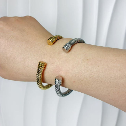 (B128)Bracciale semirigido donna intrecciato in acciaio inox