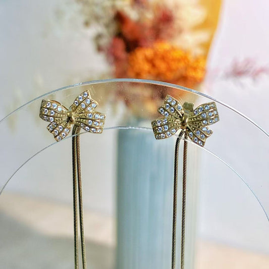 Orecchini “Nastro di Luce” – Grazia e Movimento