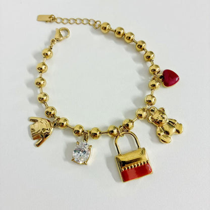 (B040) BRACCIALE DONNA CON PENDENTI IN ACCIAIO INOX