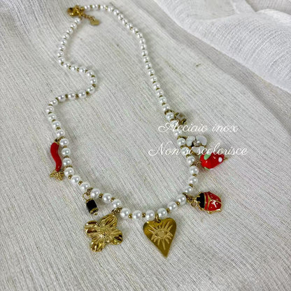 (C041)COLLANA CON CIONDOLI IN ACCIAIO INOX