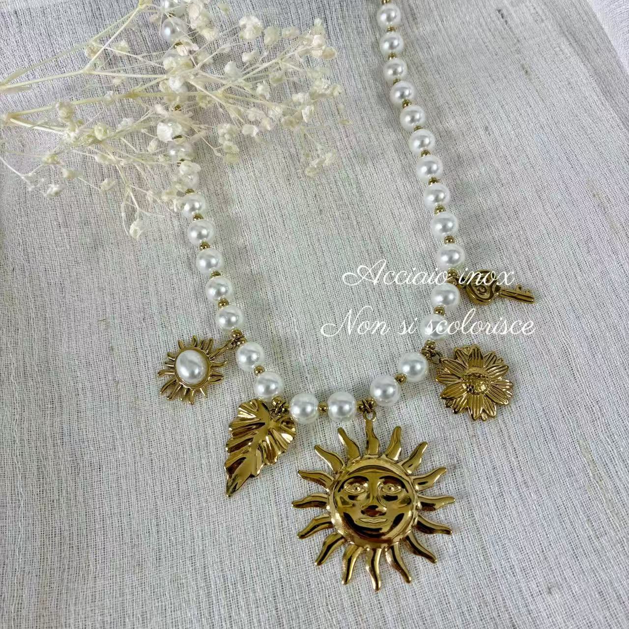 (C042) COLLANA CON PENDENTI SOLE IN ACCIAIO INOX