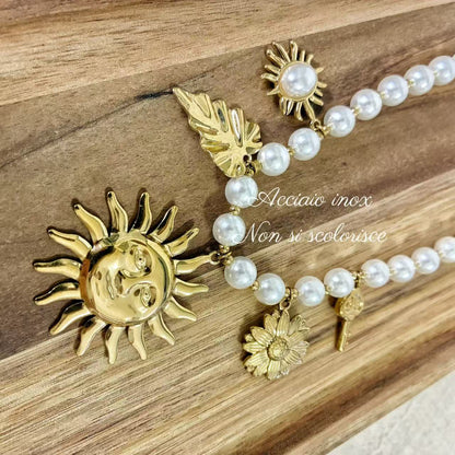 (C042) COLLANA CON PENDENTI SOLE IN ACCIAIO INOX