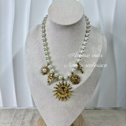 (C042) COLLANA CON PENDENTI SOLE IN ACCIAIO INOX