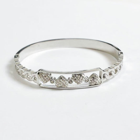 Bracciale Rigido “Cuori Luminosi” – Romanticismo Moderno in Argento