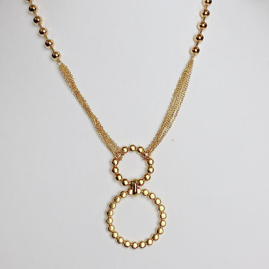 Collana “Doppio Cerchio Luminoso” – Geometria Elegante in Oro Moderno