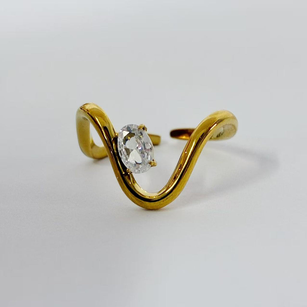 Anello “Onda di Luce” con zircone ovale  | regolabile | in acciaio inox