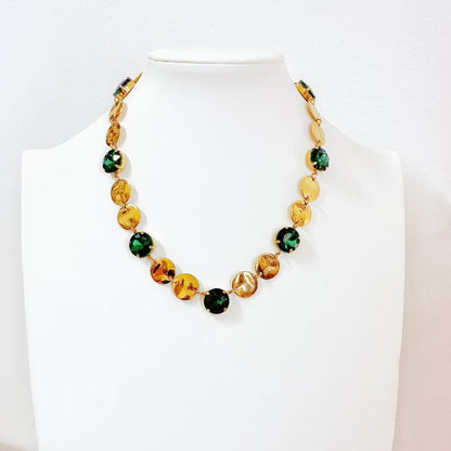 Collana con Elementi Rotondi Verde Smeraldo – Elegante e Sofisticata