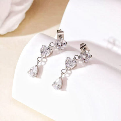 Orecchini "Trilogia di Cristallo" – Pendenti Luminosi in Acciaio